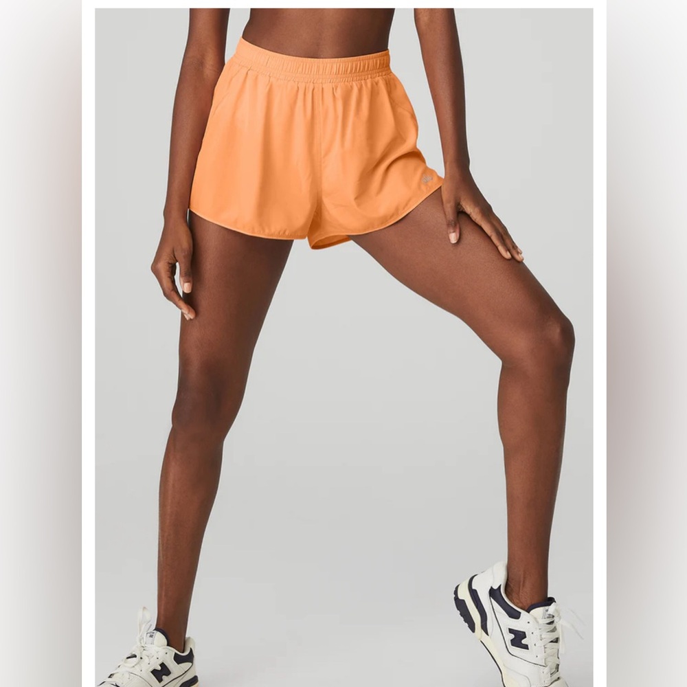 ALO Stride Short in cantaloupe Sz Med